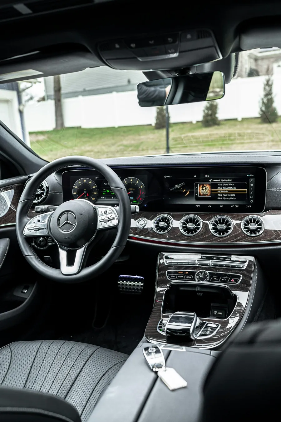 Mercedes-Benz interior showing the windshield and rear-view mirror